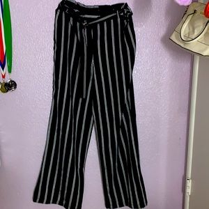 Long black pants with white stripes